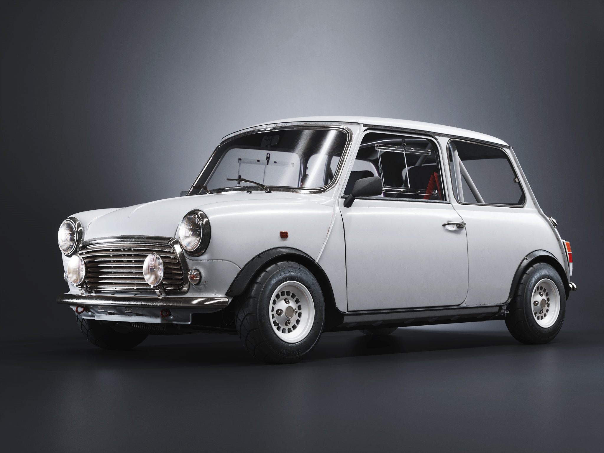 Classic white Mini with chrome details against a dark grey backdrop