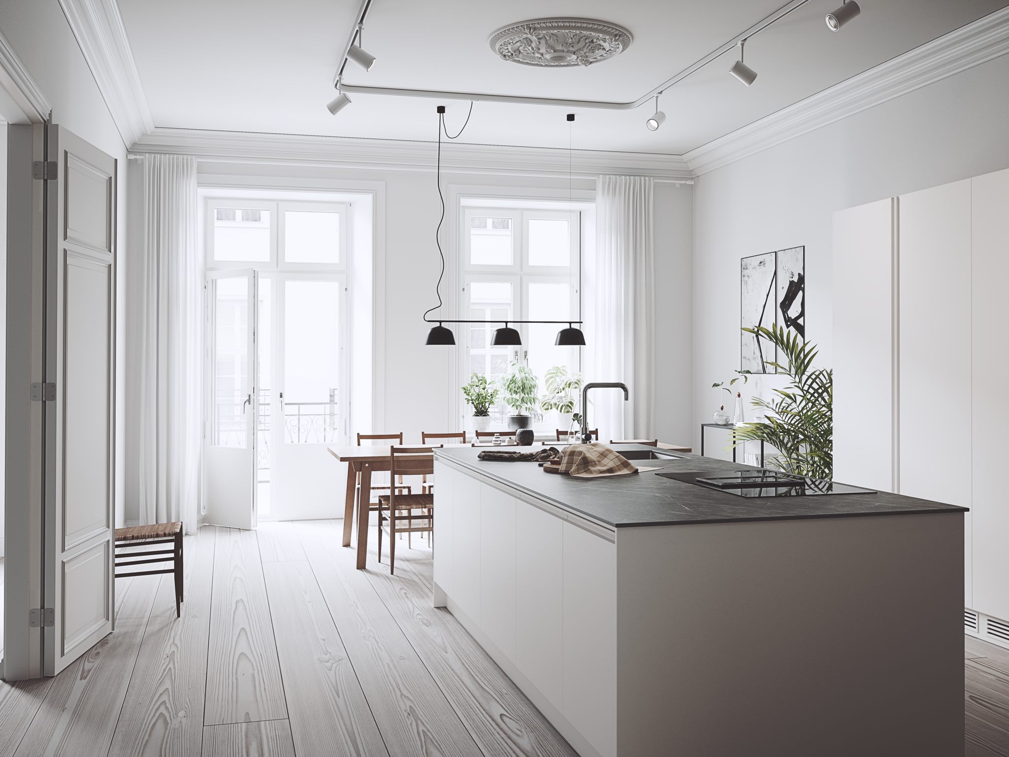 White kitchen with a long island, a dining table, track lights and glazed double doors