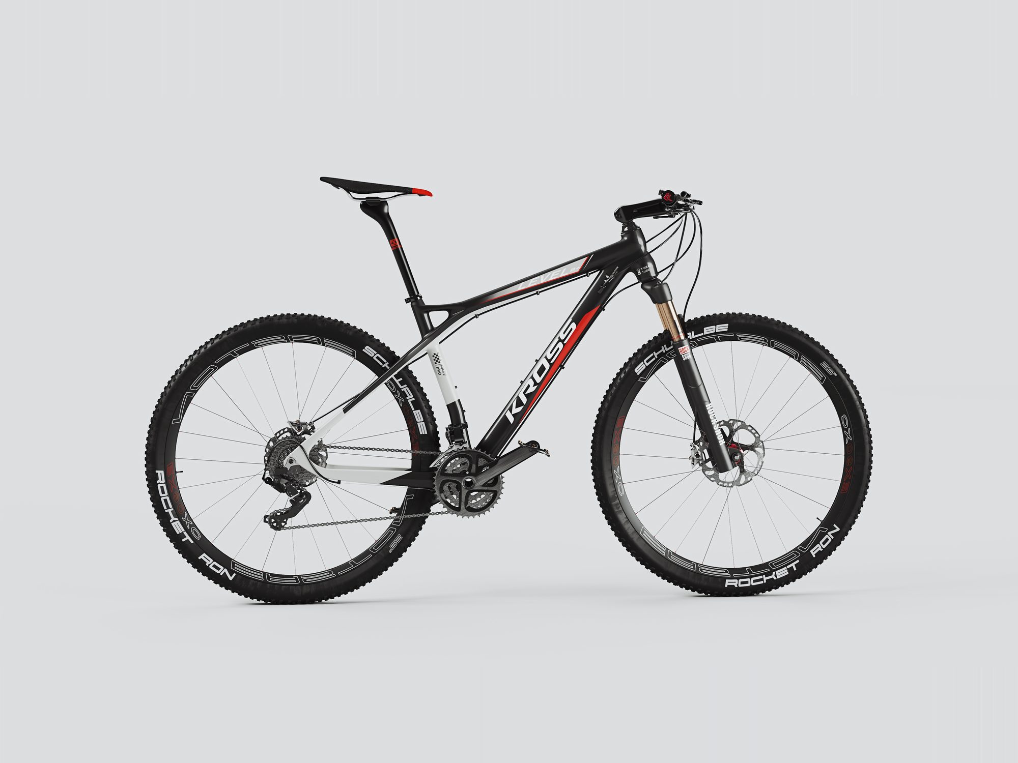 Black and red full-suspension mountain bike on a light grey background